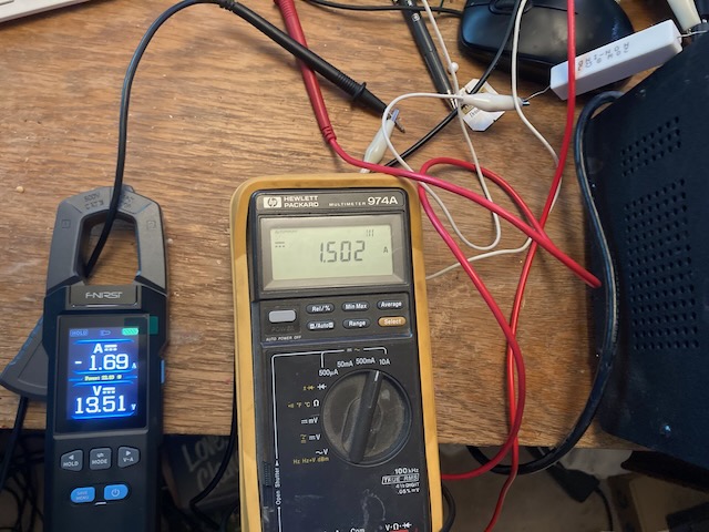 Current flow though an 8Ω load. HP 974 in circuit. DMC-100 clamped on.